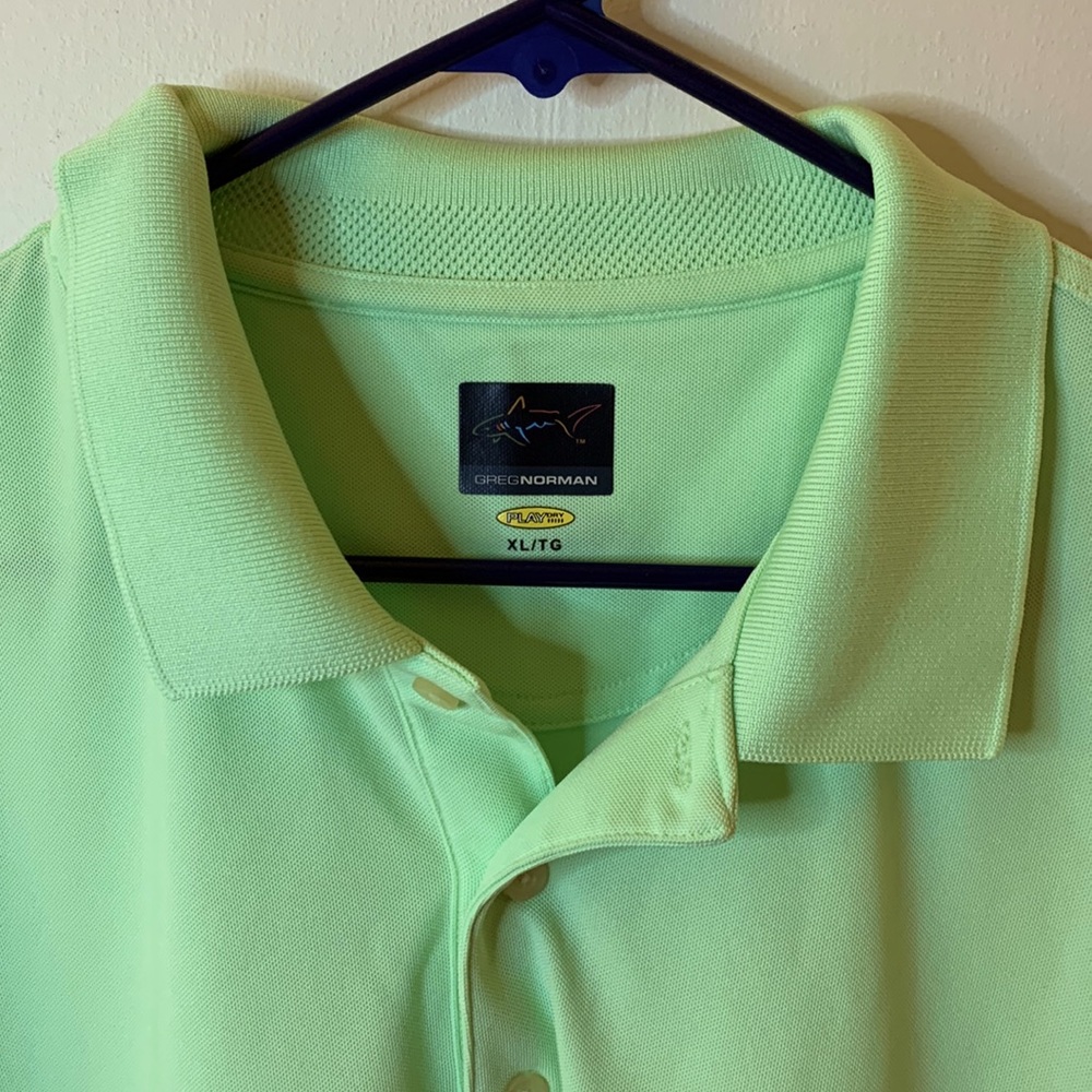 Greg Norman green polo shirt